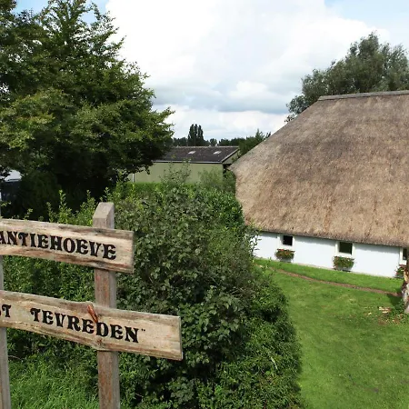 Quaint Farmhouse Near River In Oosterwijk